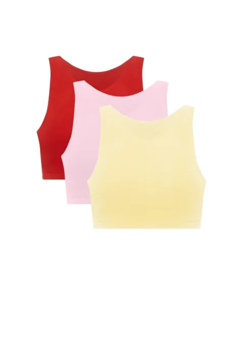 Three pastel sleeveless crop tops layered: red, pink, and yellow.