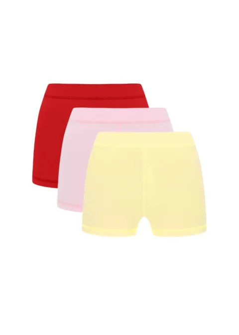 1 Three pairs of shorts in red, pink, and pale yellow stacked together in a simple display.