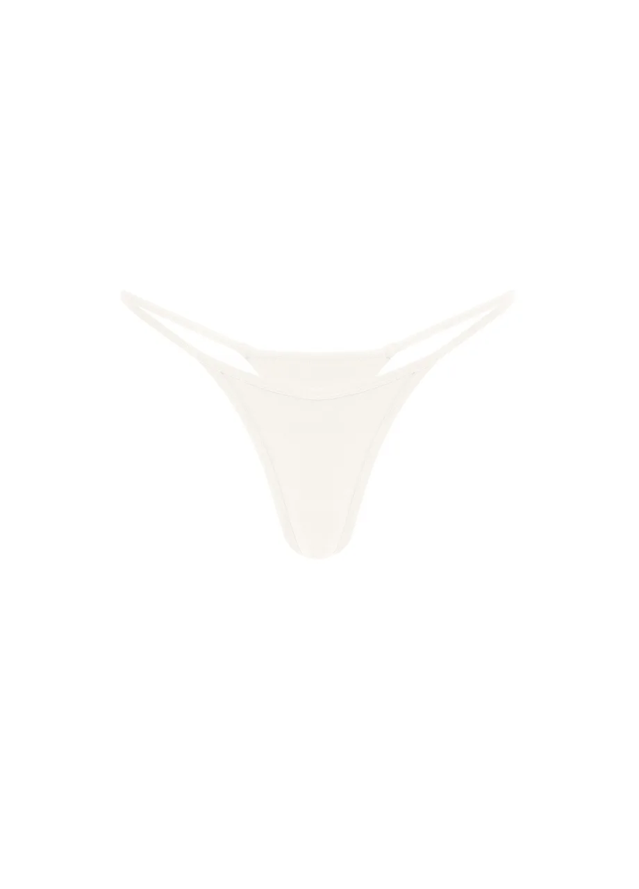 11 › Str/Cd Wear White thong bikini bottom with thin side straps on a white background