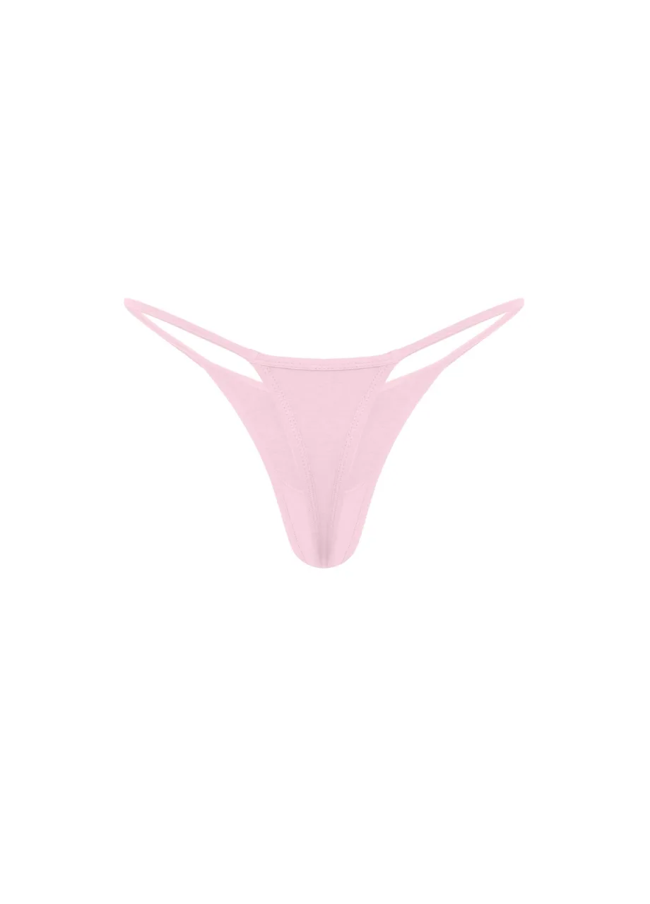 12 › Str/Cd Wear Light pink thong underwear with thin side straps on a white background, product photo accessibly labeled for shopping.
