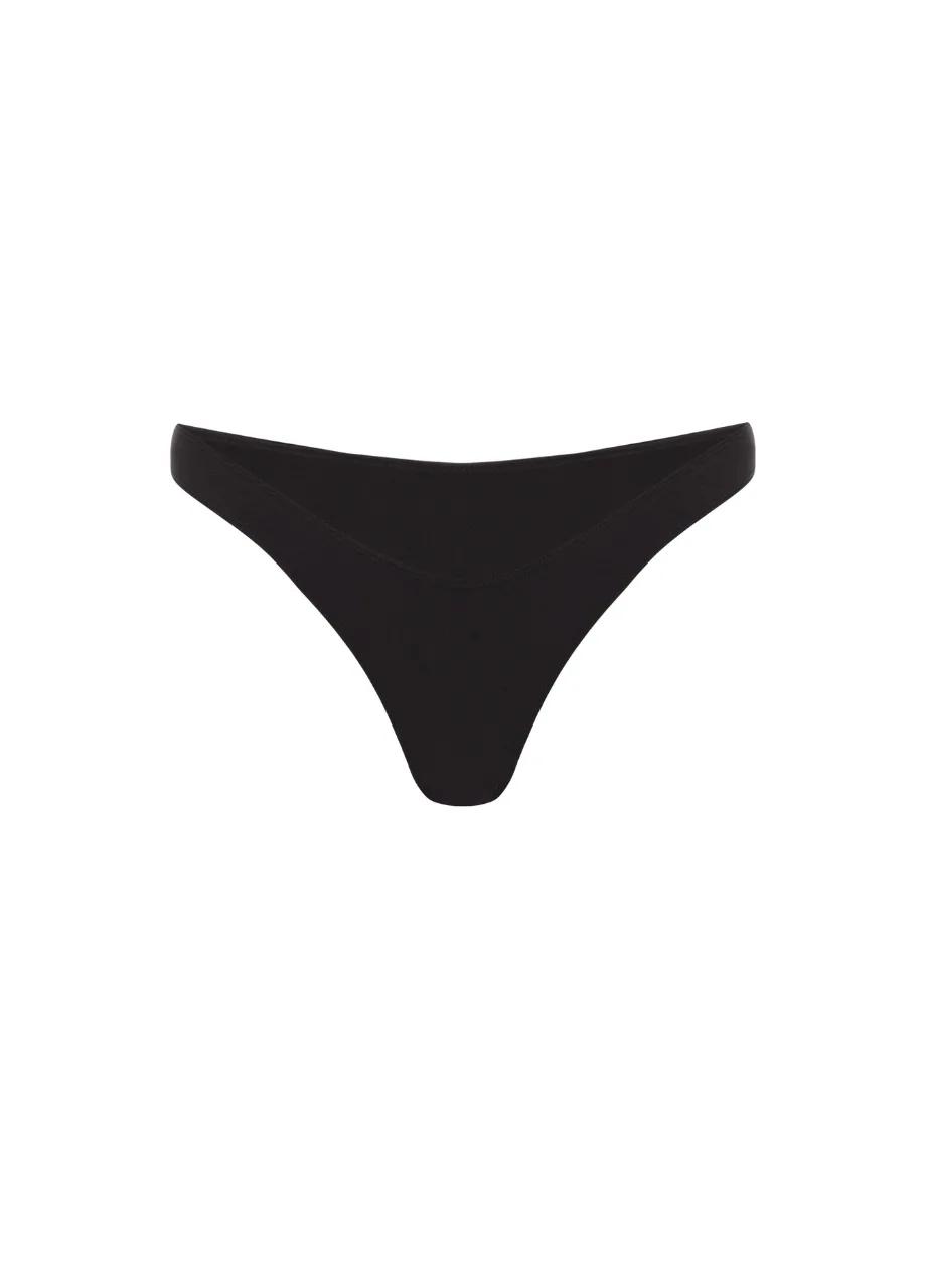 13 › Str/Cd Wear Black thong-style bikini bottom on a white background (low-rise, minimal back coverage).