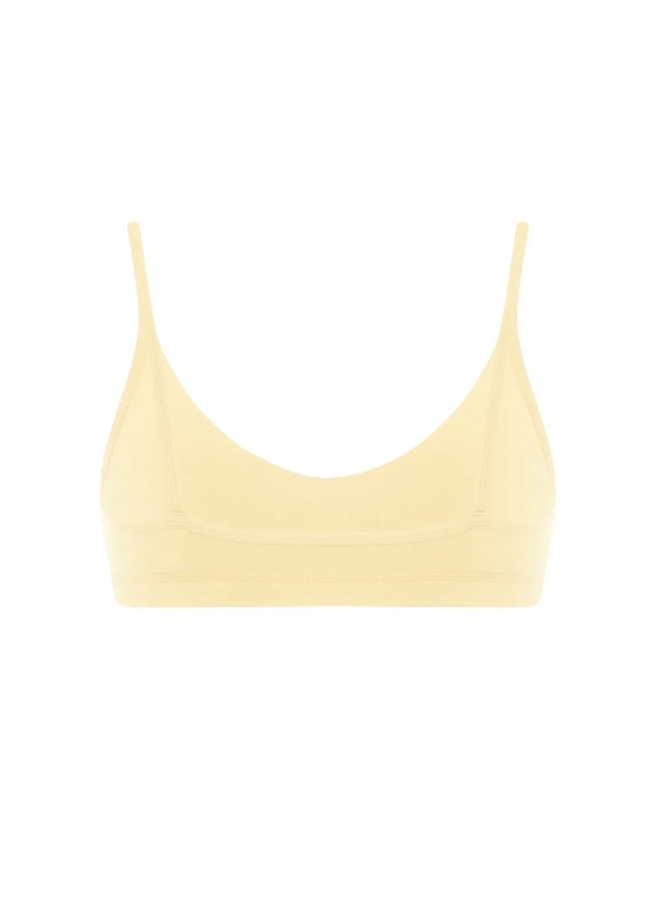 16 › Str/Cd Wear Cream-colored bralette with thin straps and a soft scoop neckline