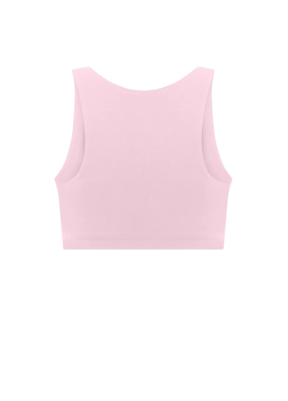17 › Str/Cd Wear Back view of a pale pink sports bra with a wide elastic band and broad shoulder straps