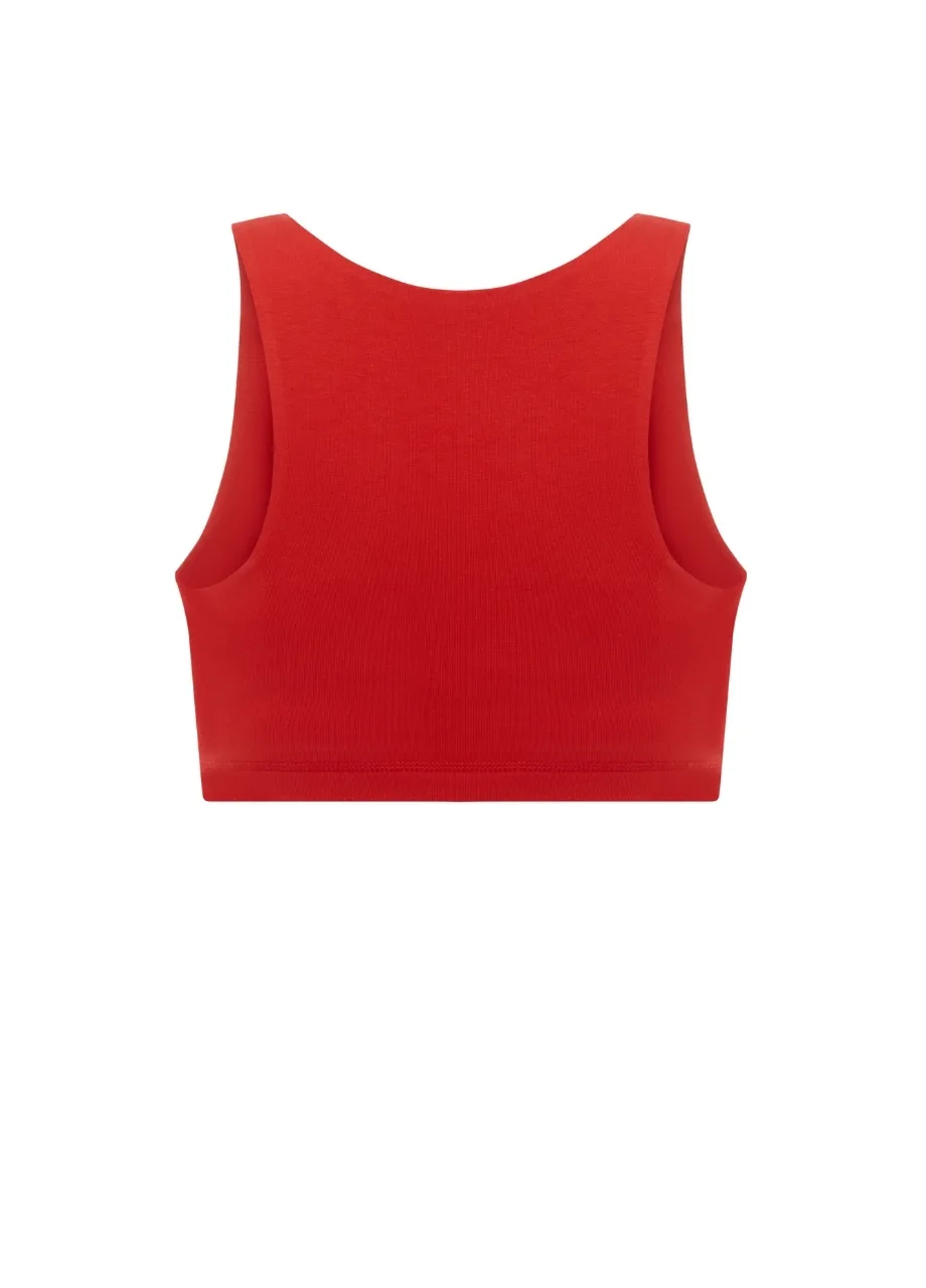 19 › Str/Cd Wear Back view of a red sleeveless crop top with a wide curved neckline and banded hem on white background