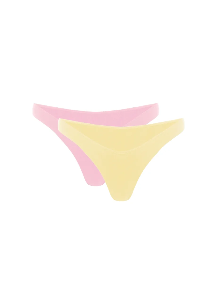 2 › Str/Cd Wear Pastel pink and pale yellow thong underwear displayed side by side on a white background in a flat lay.