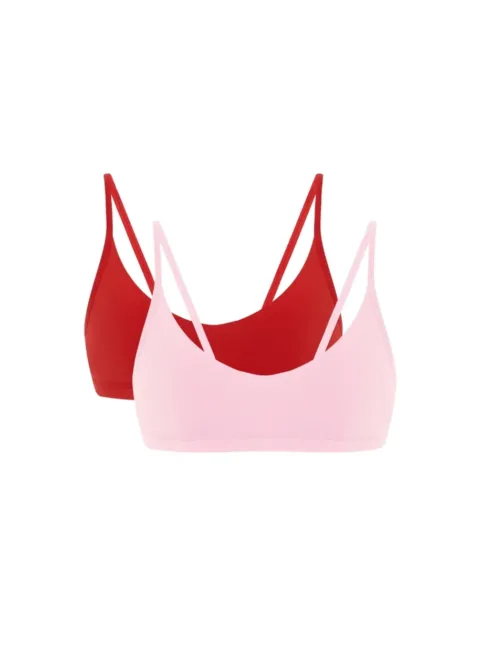 Pink bralette layered over a red bra, showing color options