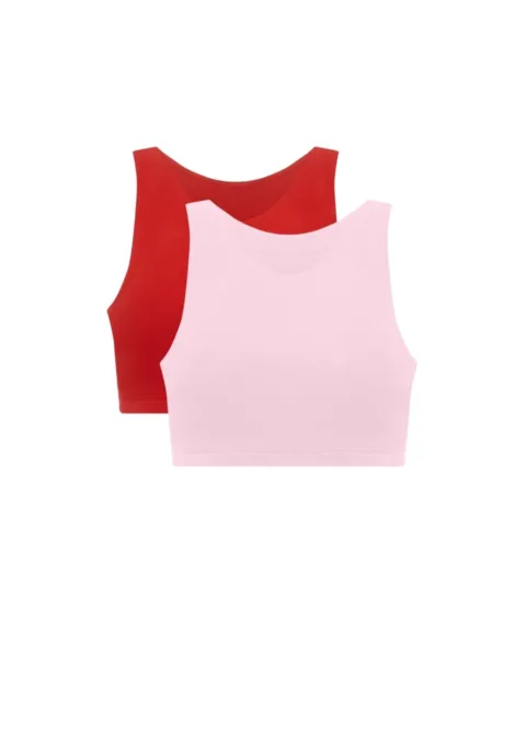 Two sleeveless crop tops layered, pink in front and red behind.