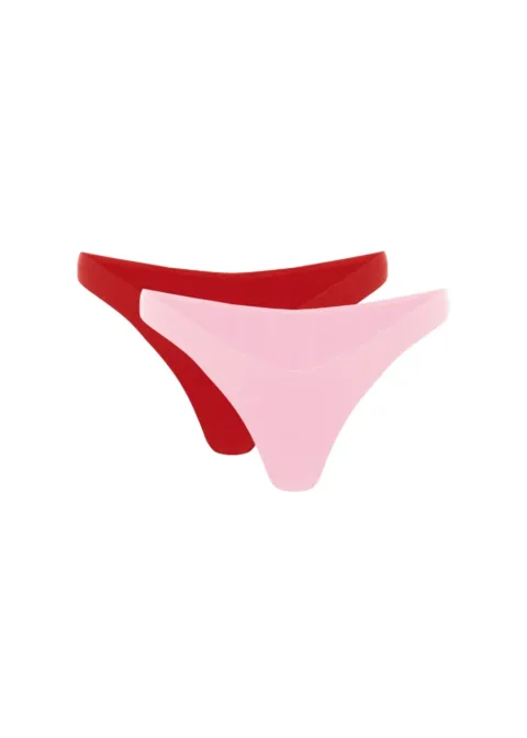 4 Two women's bikini bottoms, red and pink, layered on a white background.