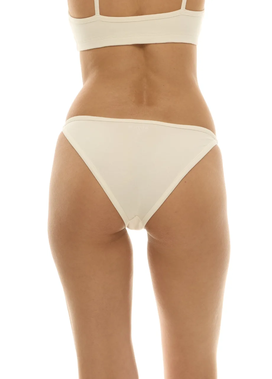 WU131422 › Str/Cd Wear Back view of a person wearing a beige bra and matching bikini bottoms, showing mid-back and hips.