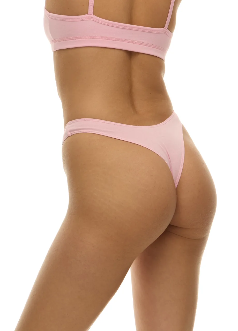 WU1314312 › Str/Cd Wear Back view of a person wearing a light pink bikini bottom and matching bra, focusing on the torso and hips.