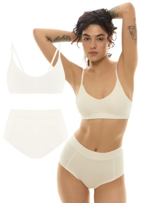 Model wearing a seamless cream bra and matching high‑waisted briefs; two product outlines of the bra and briefs appear to the left.