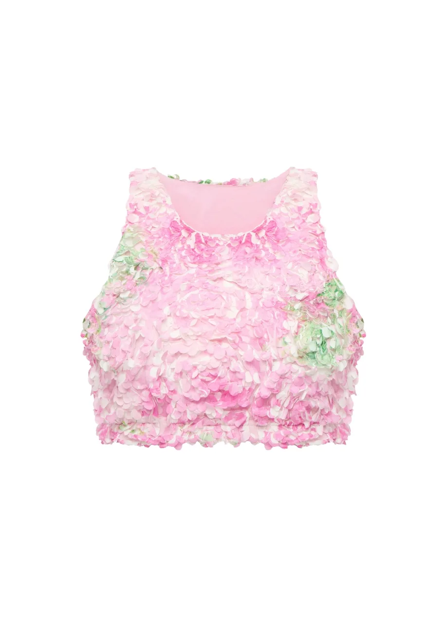 2 › Str/Cd Wear Pink sleeveless top covered in soft pink petals with subtle green accents, resembling a floral-textured garment.